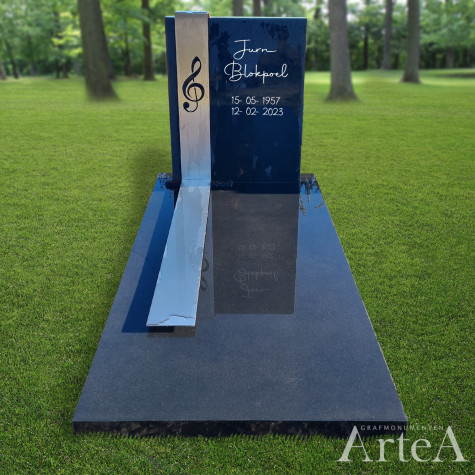 Moderne grafsteen met band van rvs