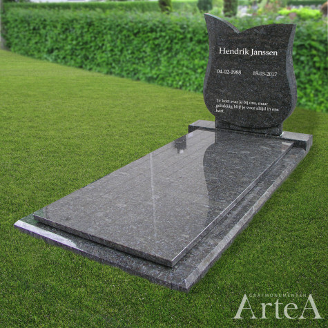 Basis grafsteen van graniet met de voor van een tulp