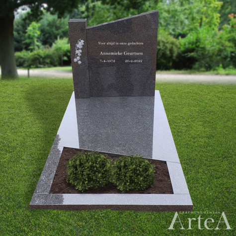 grafsteen met ets van bloem