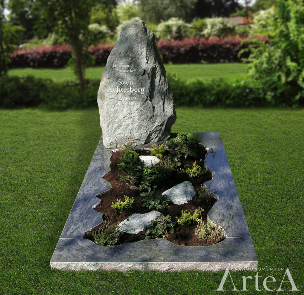 Grafmonument met grote ruwe kei en graniet