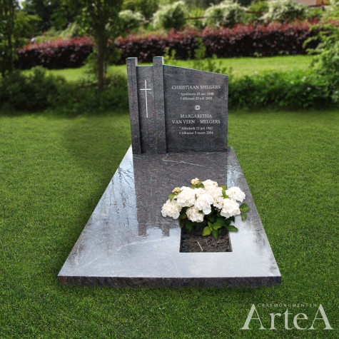 grafmonument met kruis grafsteen met planten en tuin graniet