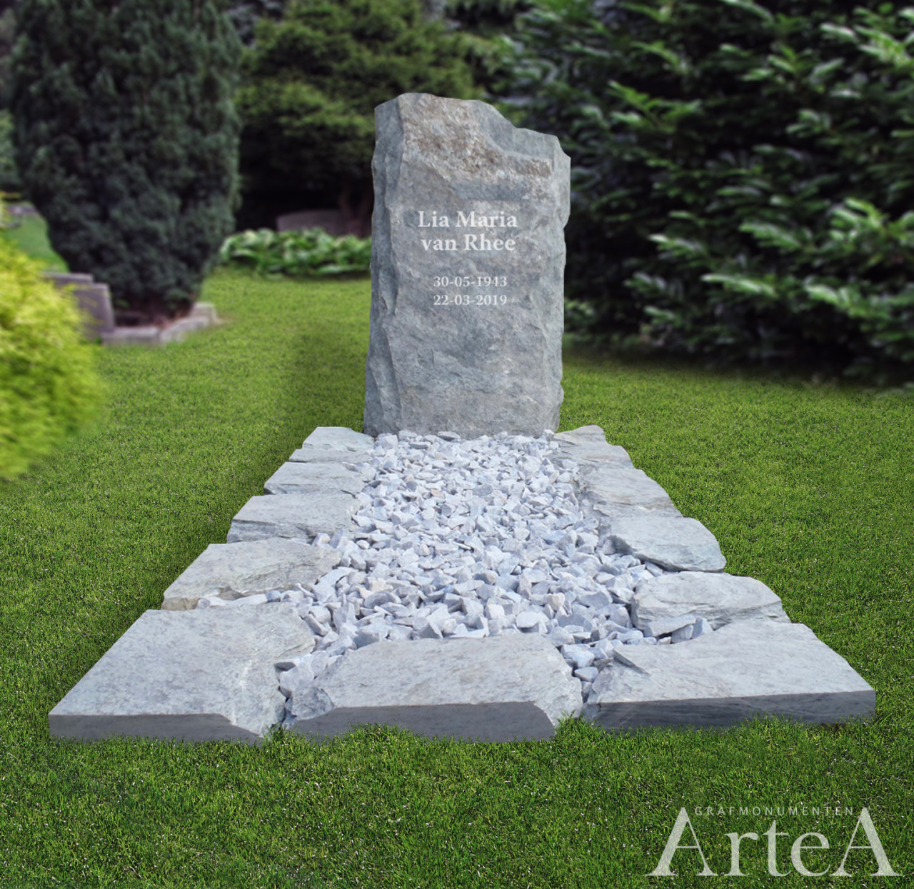 Grafmonument met rots en kei en grind