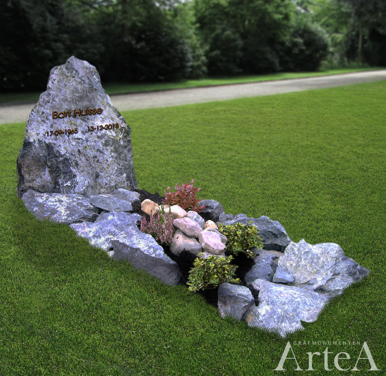 Grafmonument met rots en keien en brokstukken