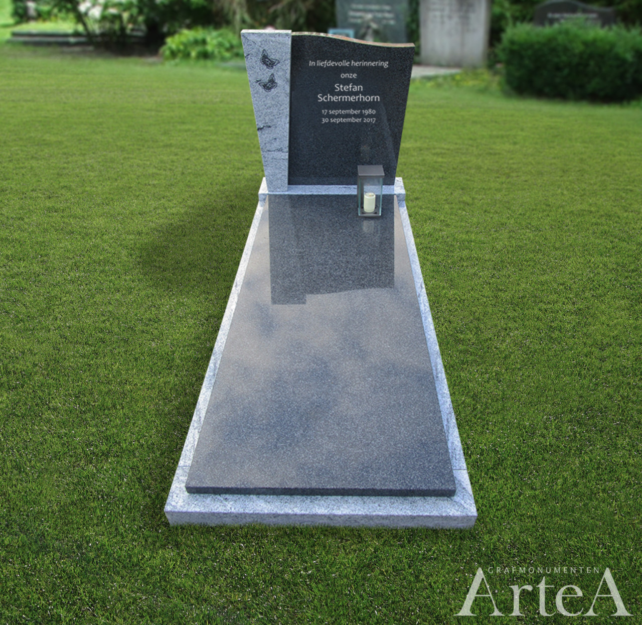 Grafsteen zwart en wit graniet grafmonument met vlind lantaarn en tekst MBS 76