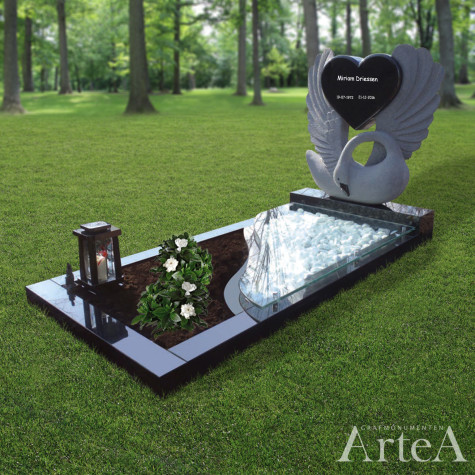 Grafsteen gans en hart grafmonument zwart graniet met glas tuin en planten