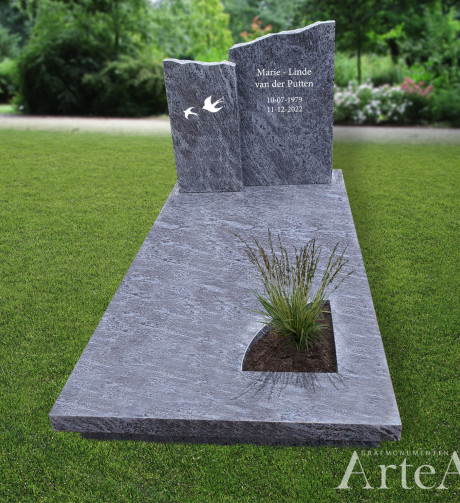 Gedenksteen met vogels