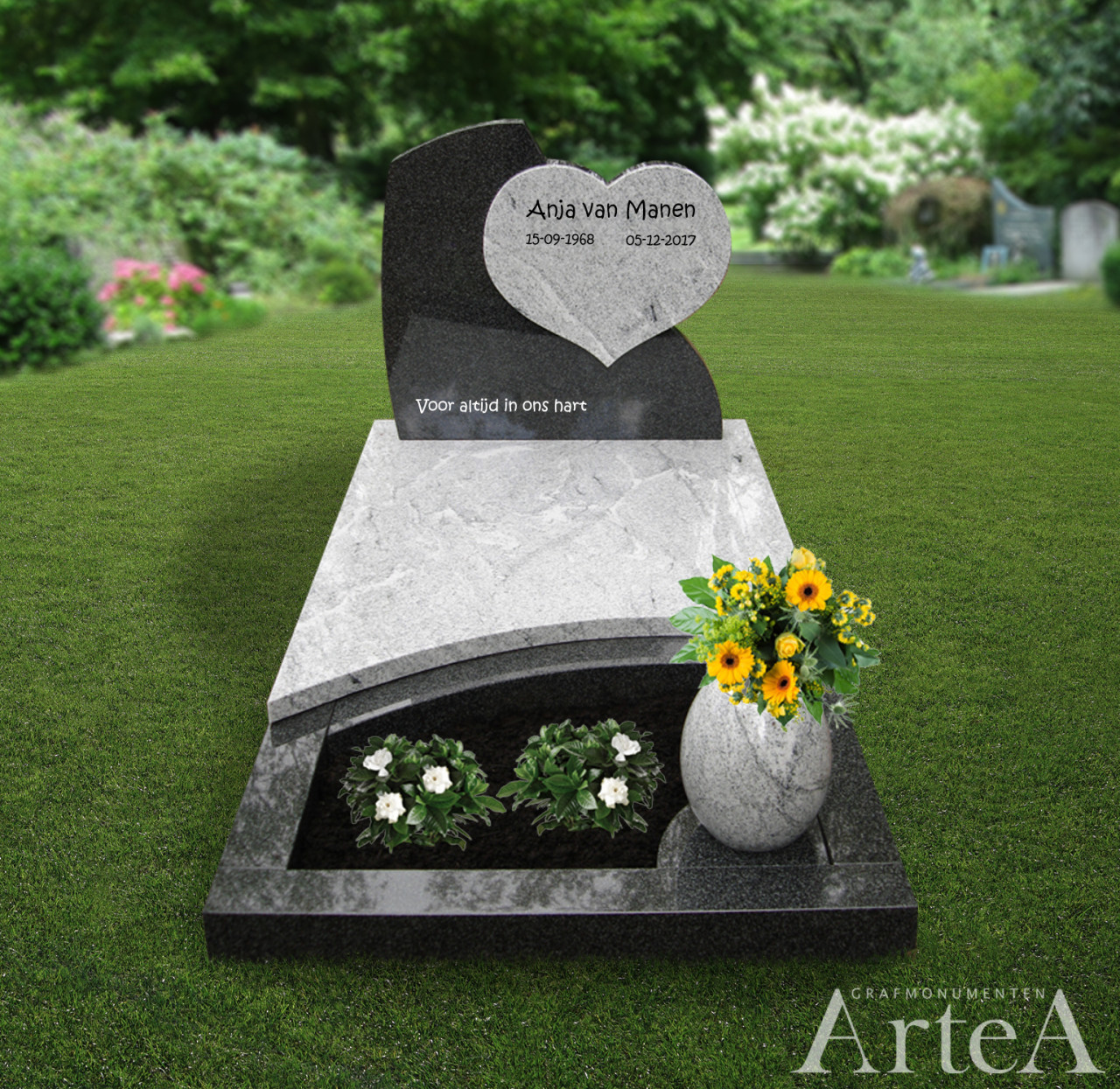 Grafsteen met hart traditioneel grafmonument met zwart en wit graniet tuin en planten