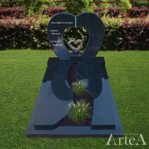 Grafsteen met hart en bronzen hart van zwart graniet