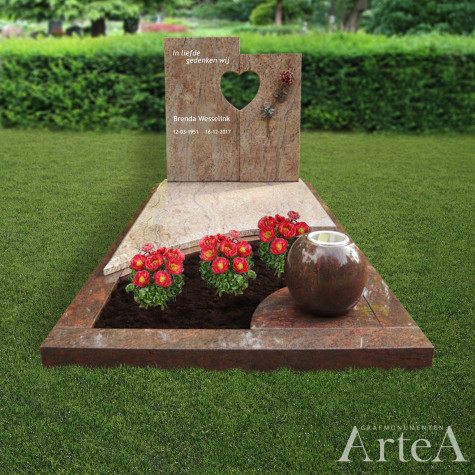 Grafsteen met hart grafmonument rood graniet met tuin