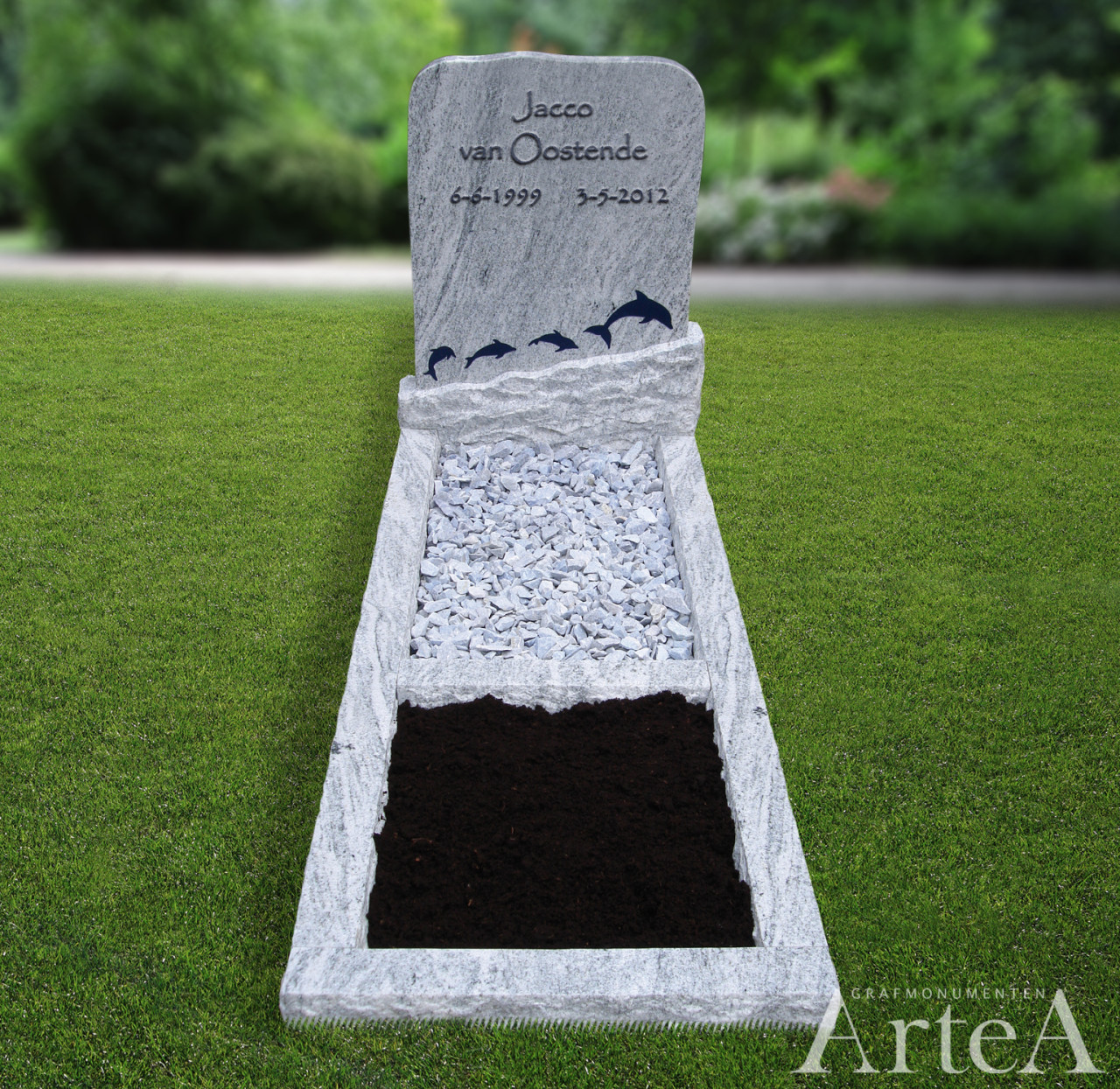 kindergrafmonument met dolfijnen