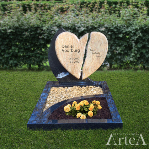 Kort grafmonument met gebroken hart en tekst en tuin