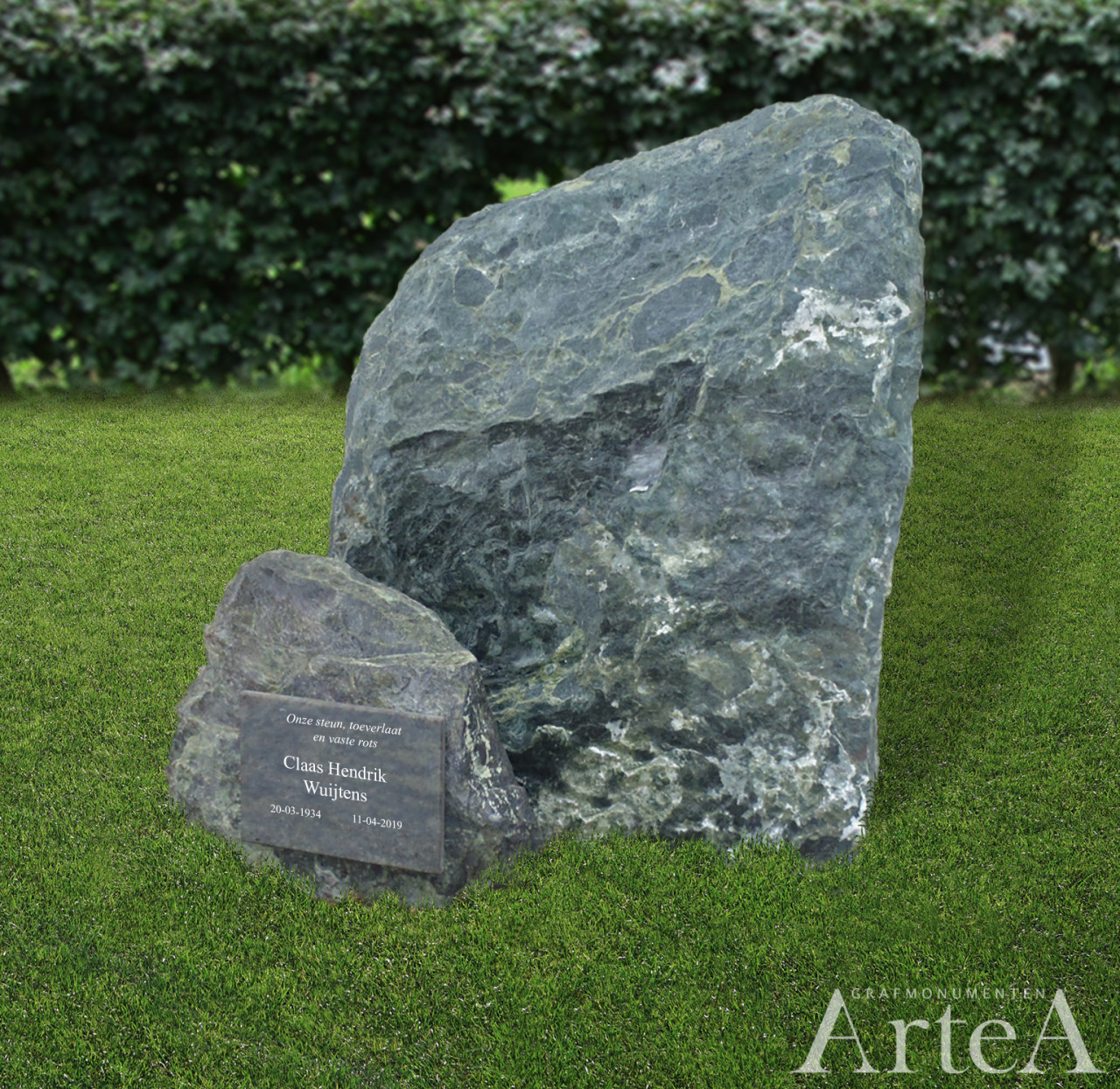Kort grafmonument met kei en naamplaat