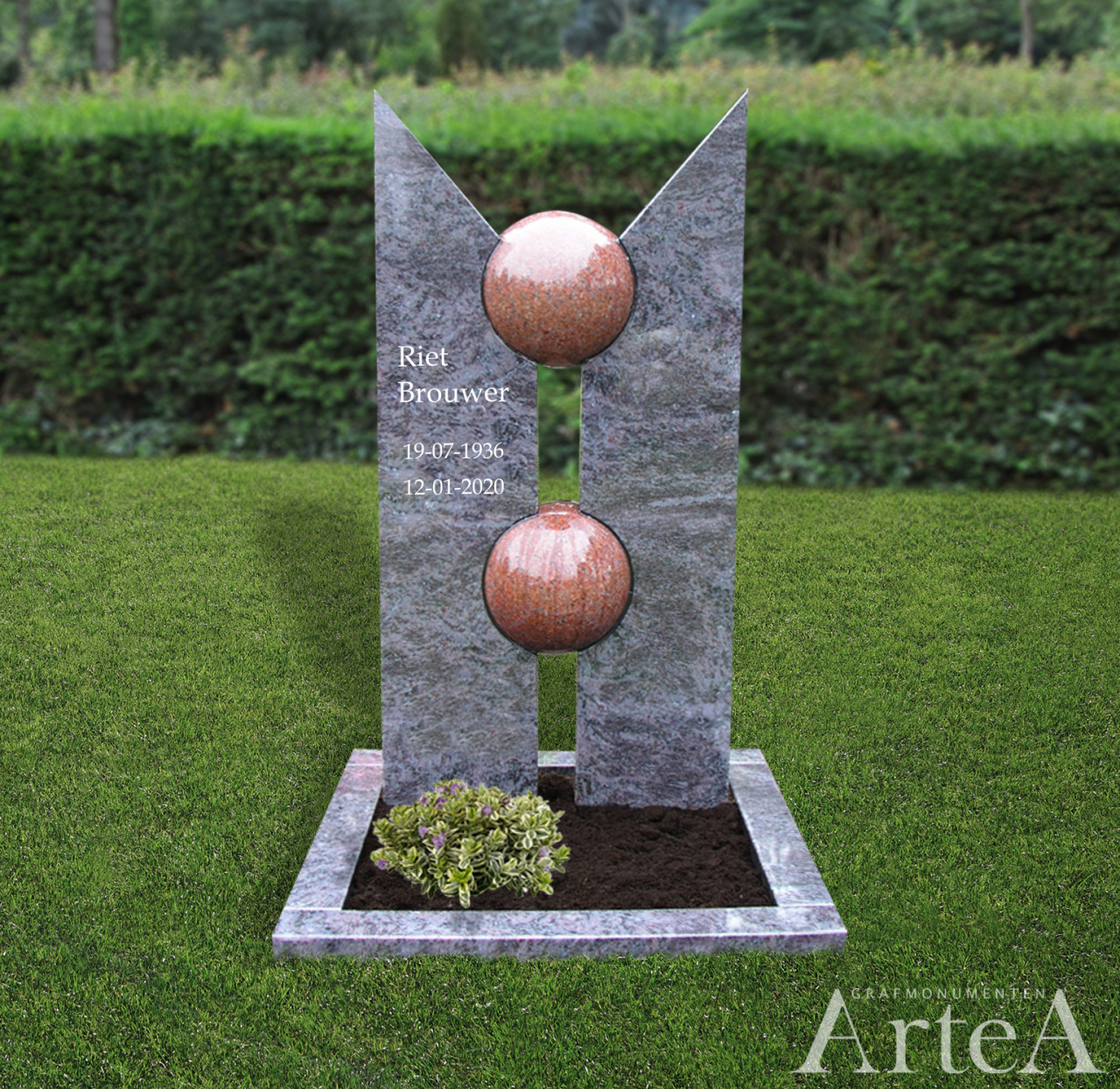 Kort monument met ballen en 2 zuilen van graniet
