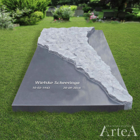 Liggende grafsteen ruw gekapt graniet