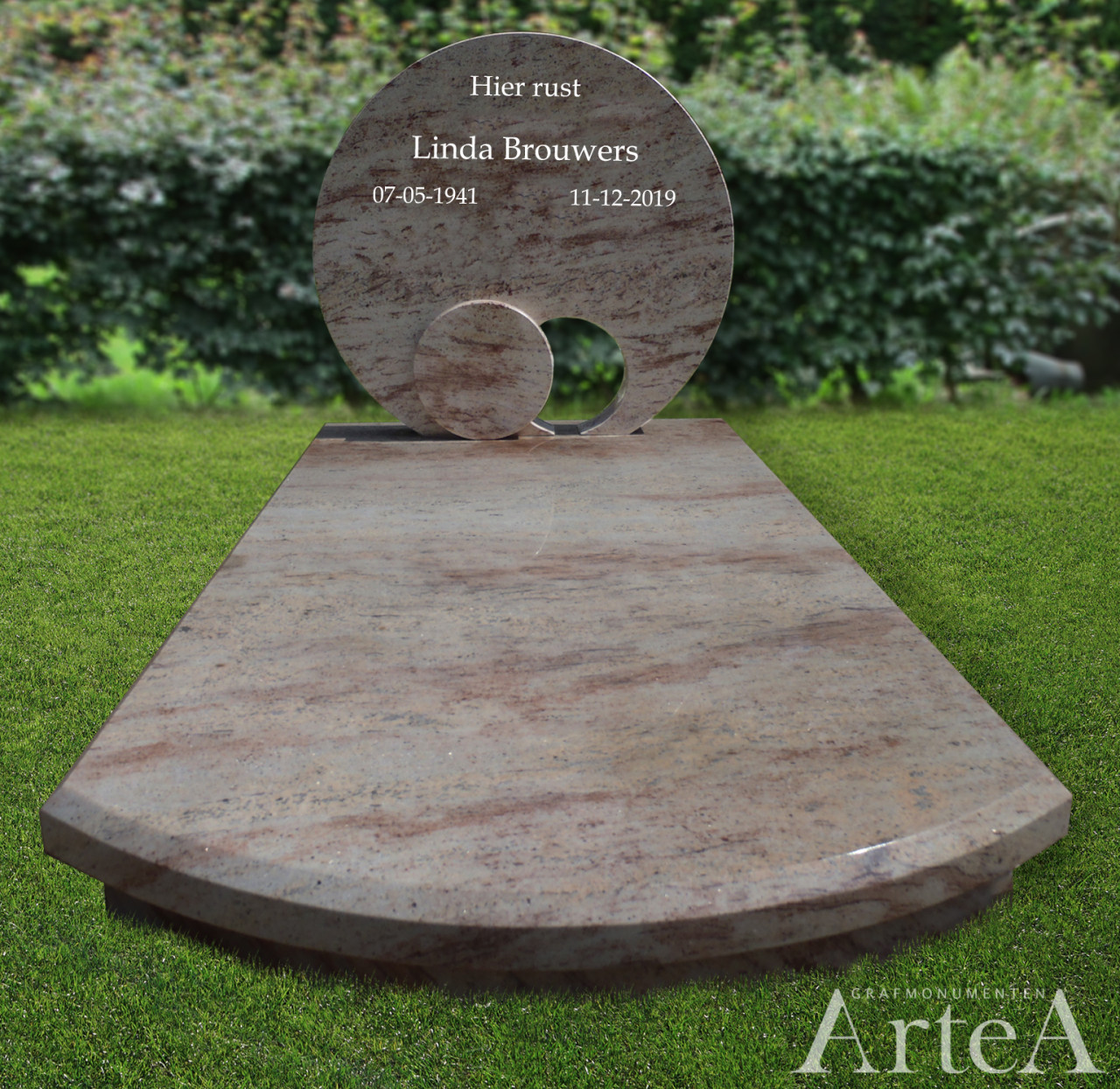 Traditioneel grafmonument met prachtig graniet en een ronde steen met gat