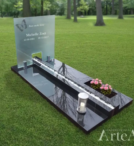 Grafsteen met glasplaat in Barneveld