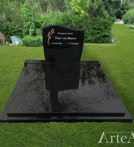 Dubbele grafsteen van zwart graniet in Barneveld
