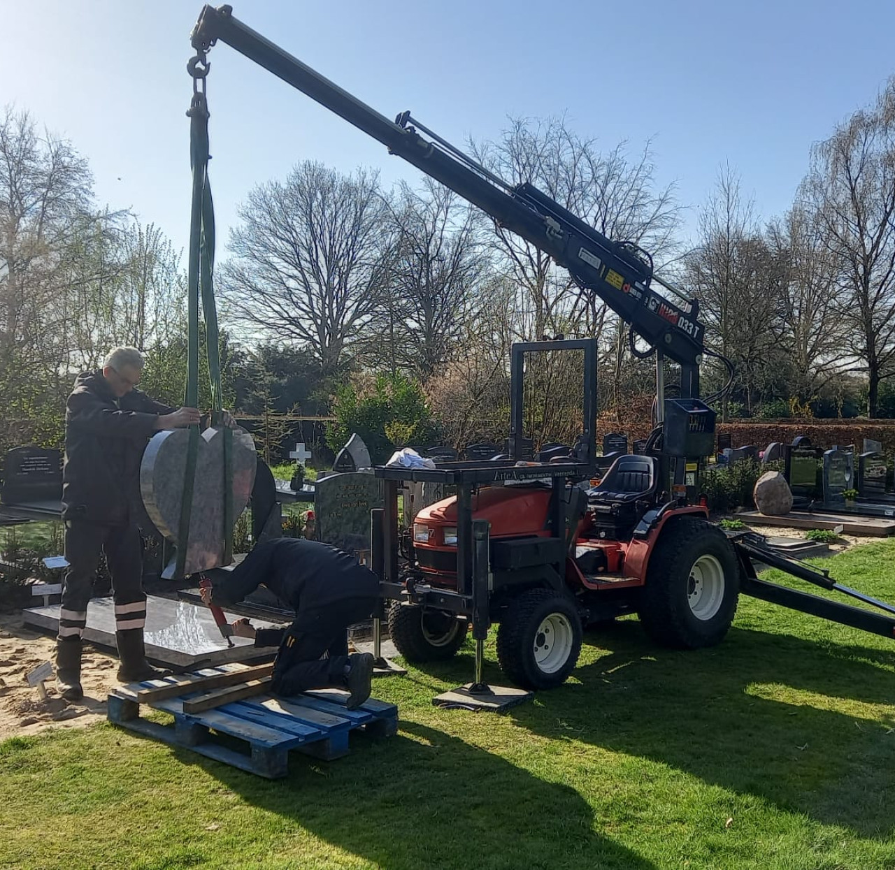 De plaatsing van een grafsteen